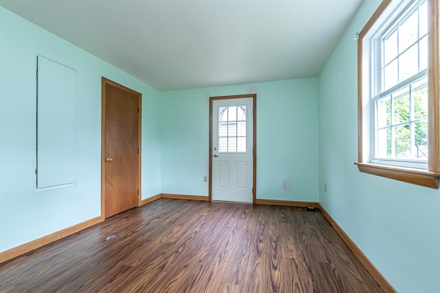 2 Ramsey Dr, Rochester, NH 03839 - unfurnished room with dark wood-style flooring, healthy amount of natural light, and baseboards
