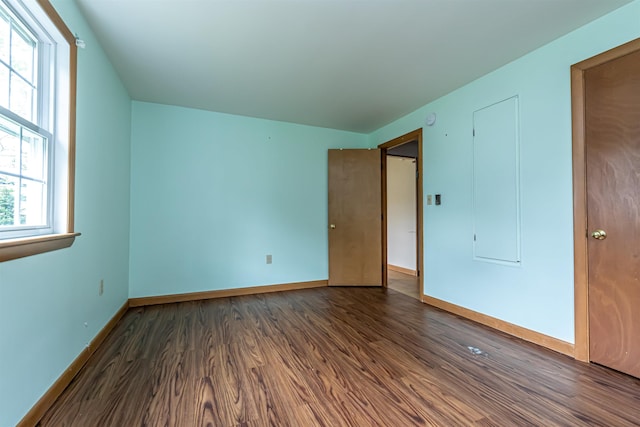 2 Ramsey Dr, Rochester, NH 03839 - unfurnished bedroom featuring wood finished floors and baseboards