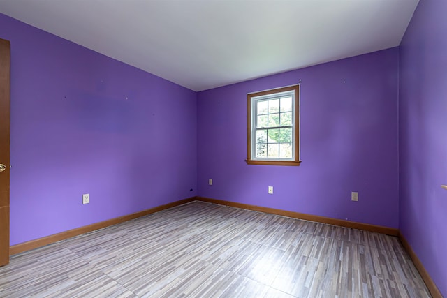 2 Ramsey Dr, Rochester, NH 03839 - empty room with baseboards and light wood-type flooring