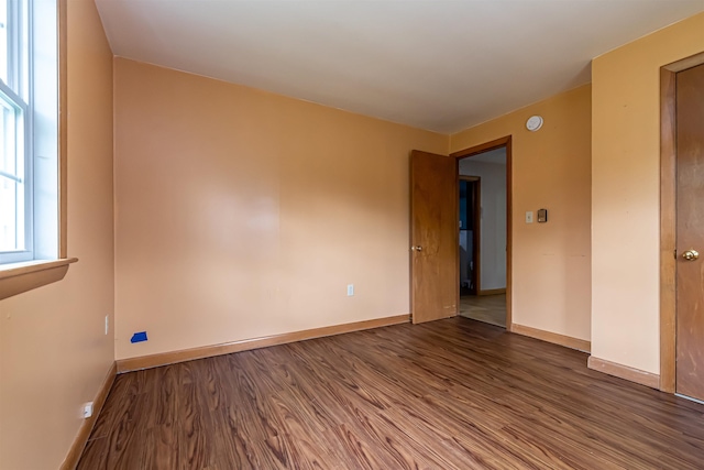 2 Ramsey Dr, Rochester, NH 03839 - empty room with wood finished floors and baseboards