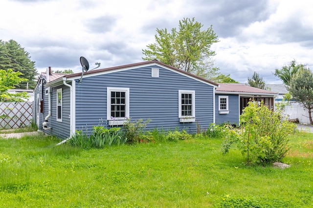 2 Ramsey Dr, Rochester, NH 03839 - rear view of property with metal roof