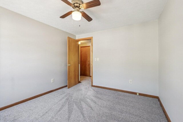 620 Hackett Hill Rd, Manchester, NH 03102 - empty room featuring light carpet, ceiling fan, and baseboards