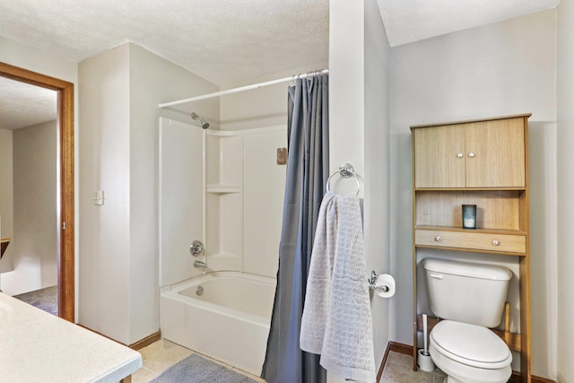 620 Hackett Hill Rd, Manchester, NH 03102 - full bath featuring baseboards, toilet, shower / tub combo, tile patterned floors, and a textured ceiling