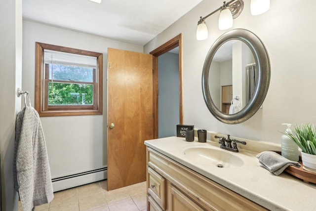 620 Hackett Hill Rd, Manchester, NH 03102 - bathroom with a baseboard radiator, vanity, and tile patterned flooring