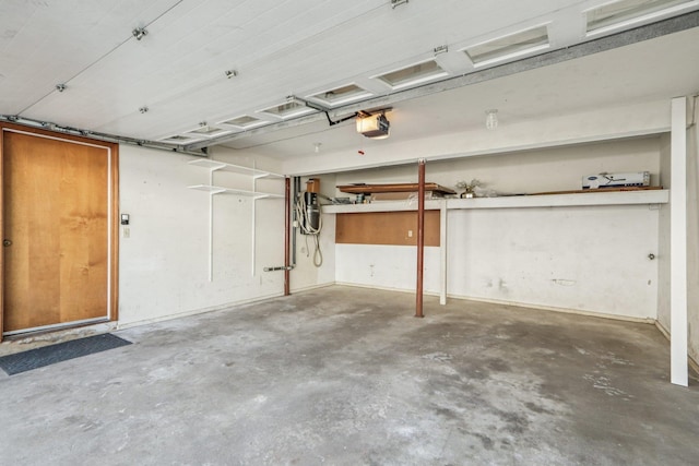 620 Hackett Hill Rd, Manchester, NH 03102 - garage featuring a garage door opener