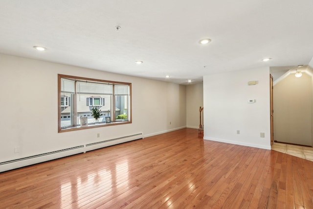 620 Hackett Hill Rd, Manchester, NH 03102 - unfurnished room featuring a baseboard heating unit, light wood-type flooring, recessed lighting, a pendent fire sprinkler, and baseboards