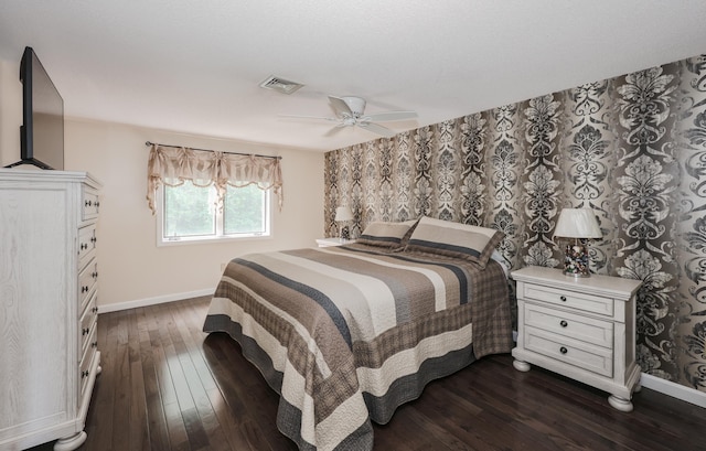 58 Hickory Ln, Windham, NH 03087 - bedroom with baseboards, dark wood-type flooring, and ceiling fan