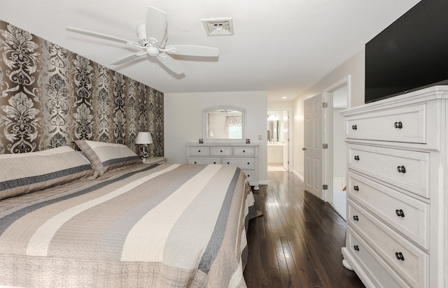 58 Hickory Ln, Windham, NH 03087 - bedroom with dark wood-style floors, ensuite bath, a ceiling fan, and baseboards