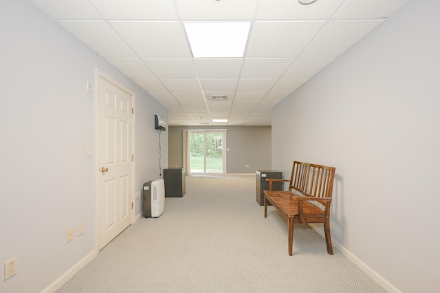 58 Hickory Ln, Windham, NH 03087 - living area featuring light carpet, a drop ceiling, and baseboards