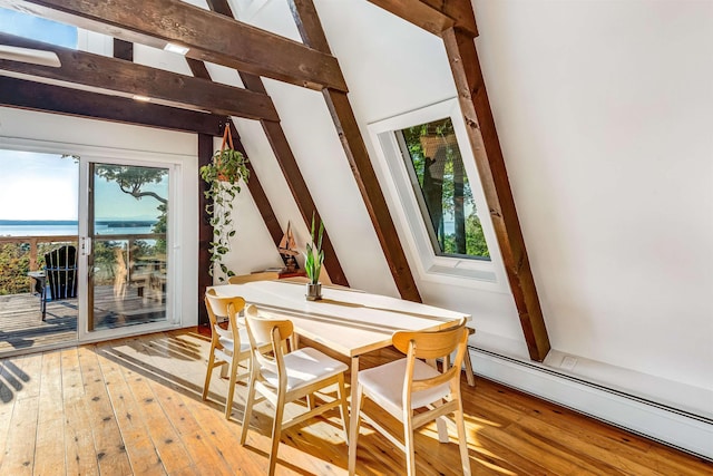 171 Cold Spring Rd, Milton, VT 05478 - dining area featuring a baseboard radiator, hardwood / wood-style floors, and plenty of natural light