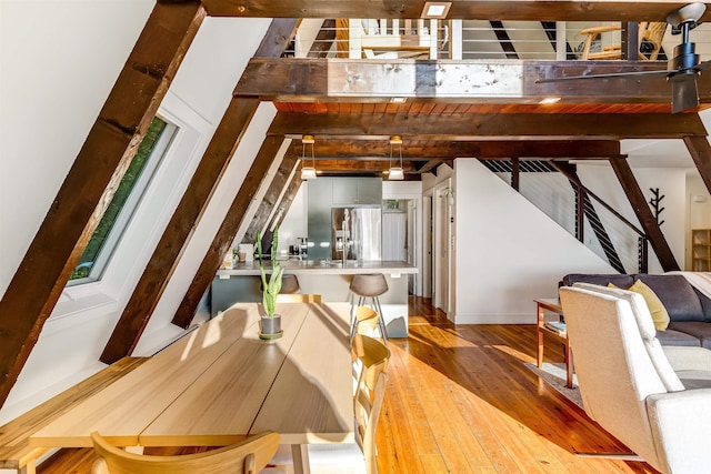 171 Cold Spring Rd, Milton, VT 05478 - dining room with light wood-style flooring and stairs