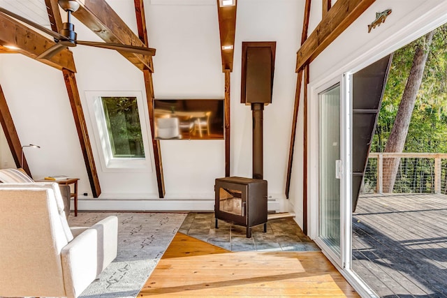 171 Cold Spring Rd, Milton, VT 05478 - entryway featuring hardwood / wood-style flooring, plenty of natural light, and a wood stove