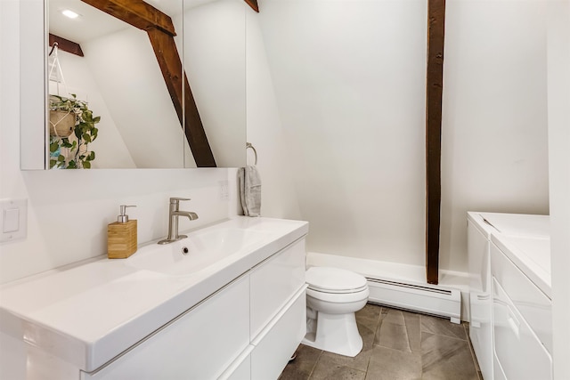 171 Cold Spring Rd, Milton, VT 05478 - bathroom with a baseboard radiator, vanity, and toilet