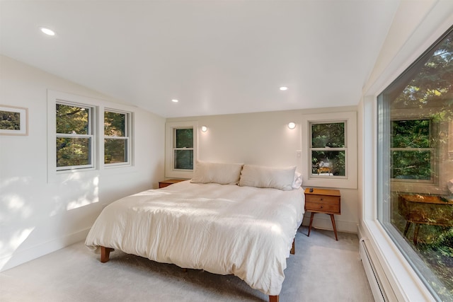 171 Cold Spring Rd, Milton, VT 05478 - bedroom with light carpet, a baseboard heating unit, baseboards, recessed lighting, and vaulted ceiling
