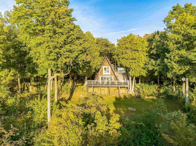 171 Cold Spring Rd, Milton, VT 05478 - back of house featuring a deck and a wooded view