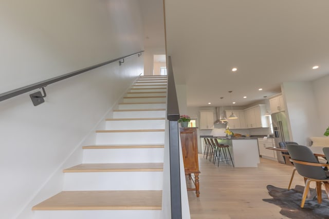 346 Elizabeths Ln Unit 13, Morristown, VT 05661 - stairs with wood finished floors and recessed lighting