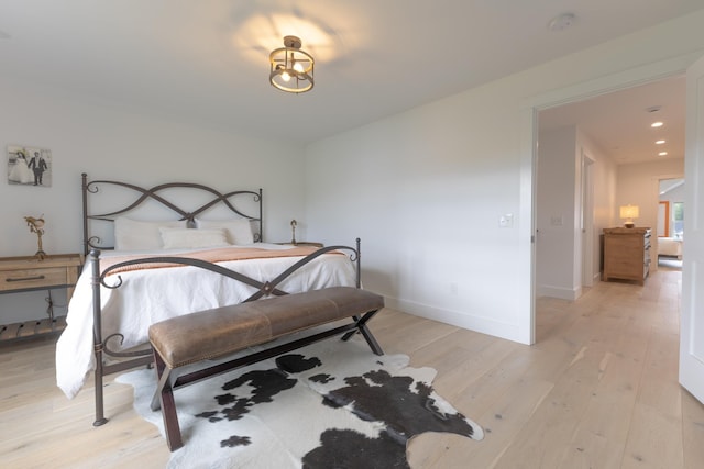 346 Elizabeths Ln Unit 13, Morristown, VT 05661 - bedroom featuring light wood-style floors, baseboards, and recessed lighting