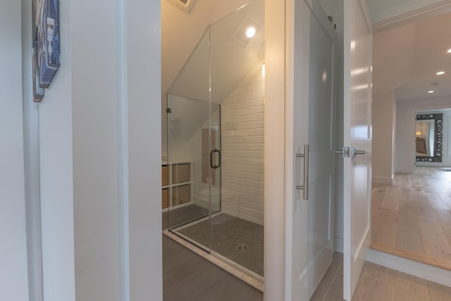 346 Elizabeths Ln Unit 13, Morristown, VT 05661 - full bathroom featuring wood finished floors, a stall shower, and recessed lighting