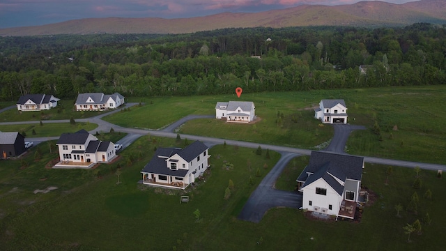 346 Elizabeths Ln Unit 13, Morristown, VT 05661 - aerial view of a forest and a mountainous background