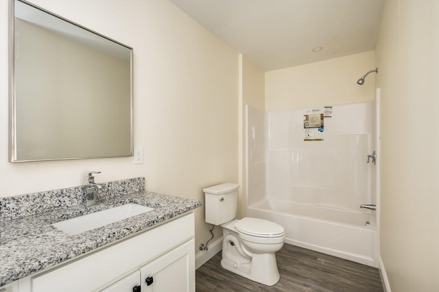 725 Central Ave Unit 103, Dover, NH 03820 - bathroom featuring wood finished floors, vanity, and bathtub / shower combination