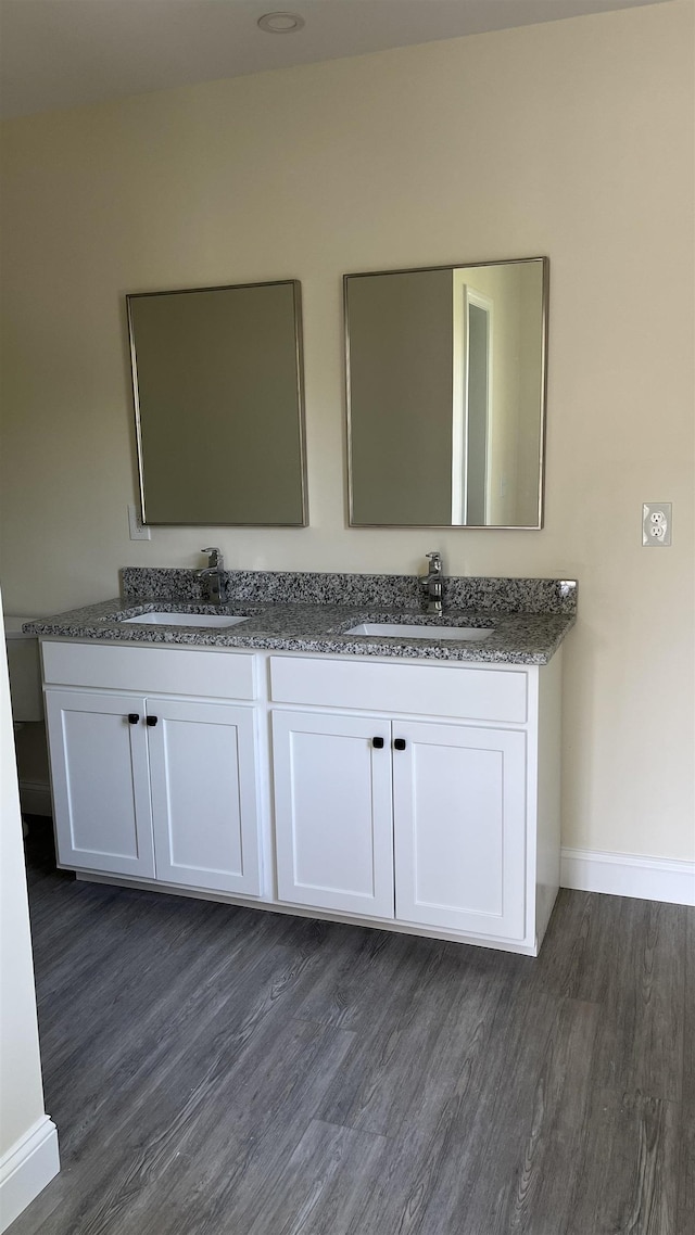 725 Central Ave Unit 103, Dover, NH 03820 - full bath with wood finished floors and double vanity