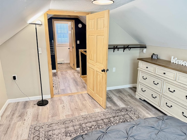 11 Francestown Rd, Bennington, NH 03442 - bonus room featuring light wood finished floors, lofted ceiling, baseboards, and baseboard heating