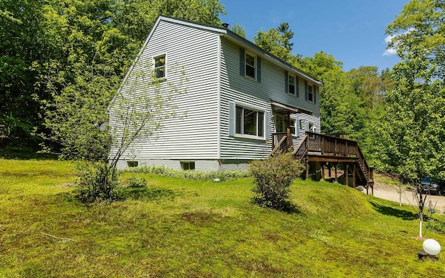353 N St, Jaffrey, NH 03452 - view of side of home with a deck, a lawn, and stairs