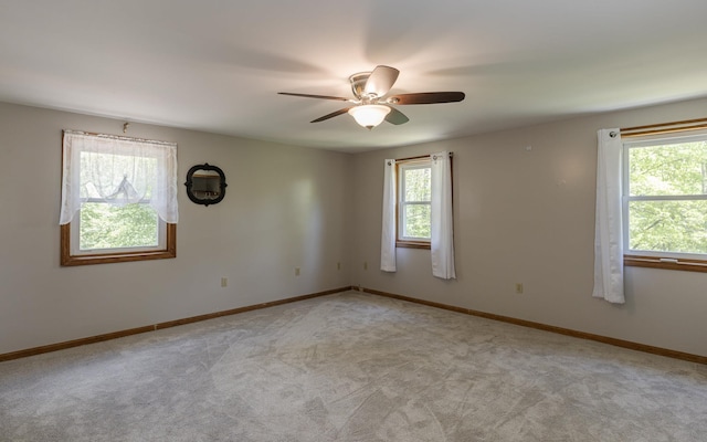 353 N St, Jaffrey, NH 03452 - unfurnished room with a ceiling fan, light carpet, and baseboards