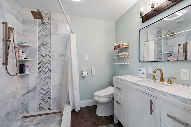 2 Candlewood Rd, Windham, NH 03087 - bathroom featuring vanity, toilet, tiled shower, and baseboards