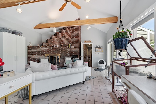 2 Candlewood Rd, Windham, NH 03087 - living area with ceiling fan, light tile patterned floors, rail lighting, a fireplace, and high vaulted ceiling