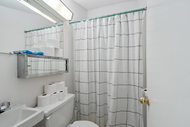 2 Candlewood Rd, Windham, NH 03087 - bathroom featuring a sink, toilet, and a shower with shower curtain