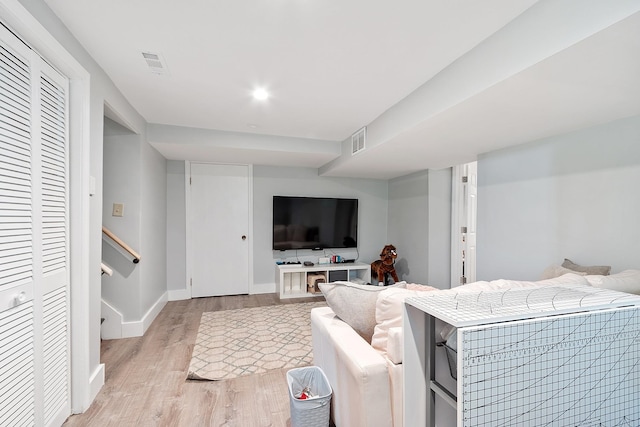 2 Candlewood Rd, Windham, NH 03087 - living area with light wood-style floors, baseboards, and stairway