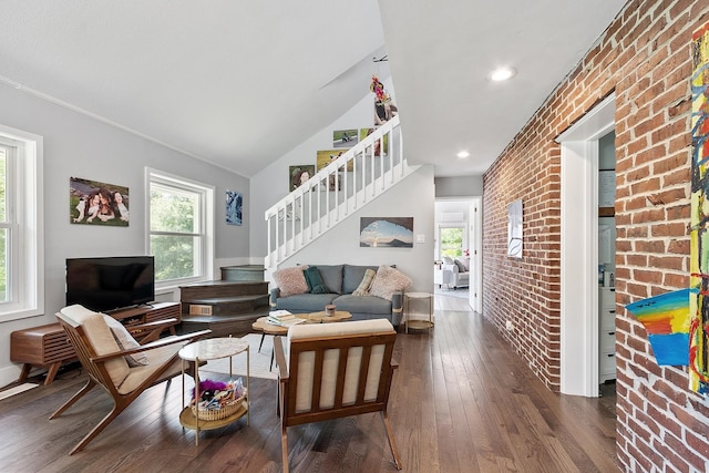 2 Candlewood Rd, Windham, NH 03087 - living area featuring stairs, brick wall, healthy amount of natural light, dark wood-type flooring, and baseboards