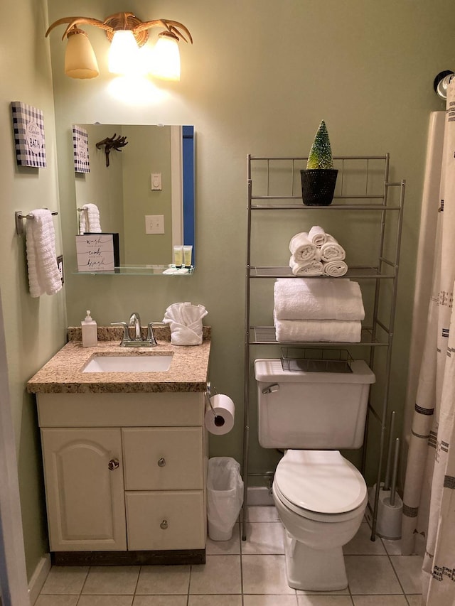 36 Lodge Rd Unit B105, Lincoln, NH 03251 - full bath with toilet, vanity, and tile patterned floors