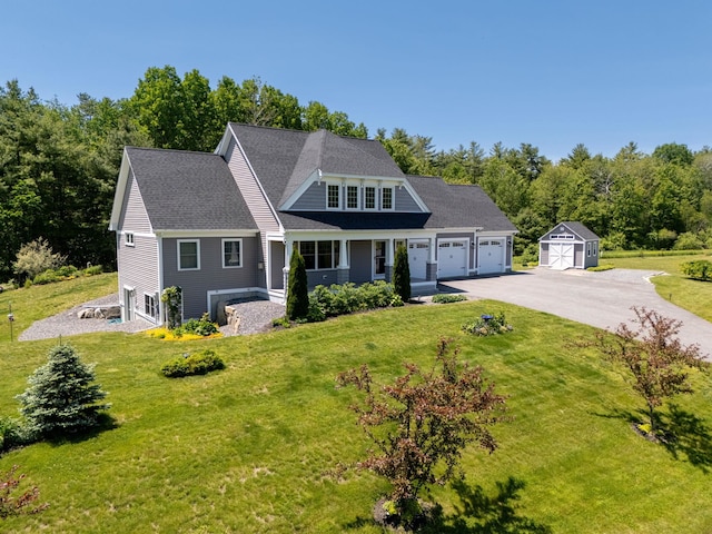 6 Tannery Way, Kensington, NH 03833 - shingle-style home with asphalt driveway, a front lawn, a garage, and a shingled roof