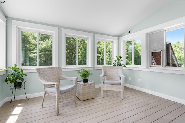 6 Tannery Way, Kensington, NH 03833 - sunroom with vaulted ceiling, wood finished floors, and baseboards
