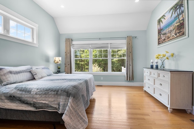 6 Tannery Way, Kensington, NH 03833 - bedroom with lofted ceiling, light wood-style floors, baseboards, and recessed lighting