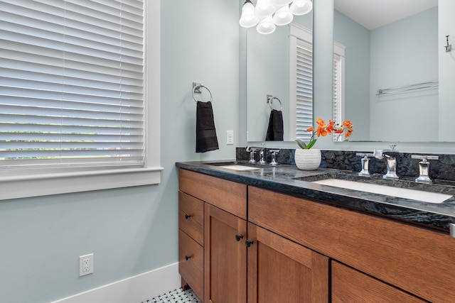 6 Tannery Way, Kensington, NH 03833 - bathroom with double vanity and baseboards