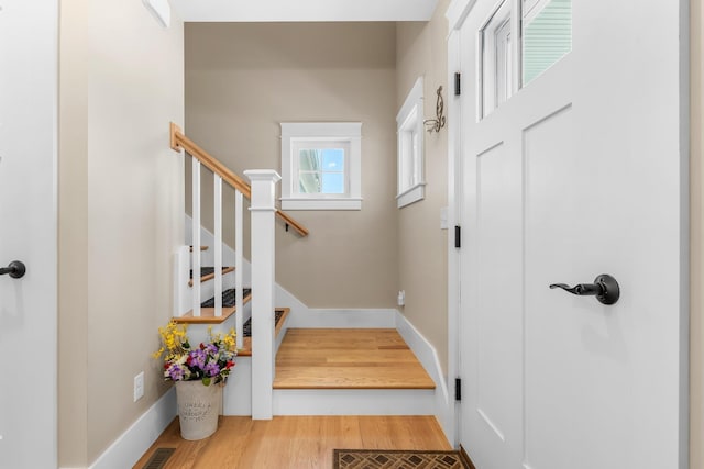 6 Tannery Way, Kensington, NH 03833 - stairs with wood finished floors and baseboards