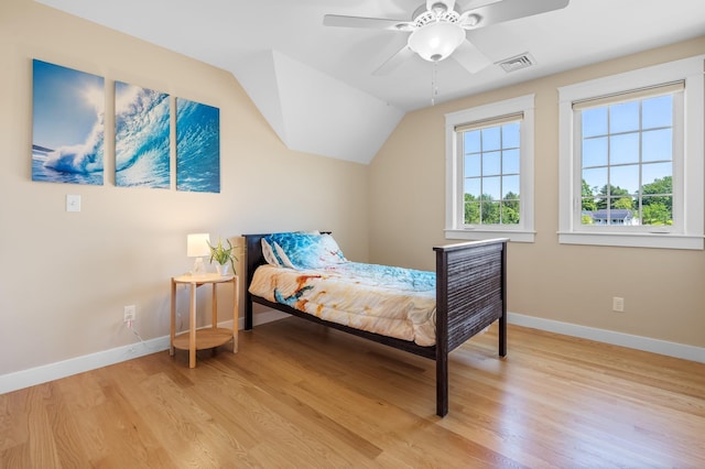 6 Tannery Way, Kensington, NH 03833 - bedroom featuring baseboards, light wood-style floors, a ceiling fan, and vaulted ceiling