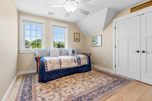 6 Tannery Way, Kensington, NH 03833 - bedroom featuring wood finished floors, baseboards, a ceiling fan, lofted ceiling, and a closet