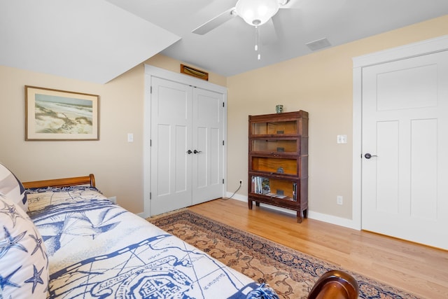 6 Tannery Way, Kensington, NH 03833 - bedroom featuring light wood-style floors, a closet, baseboards, and ceiling fan
