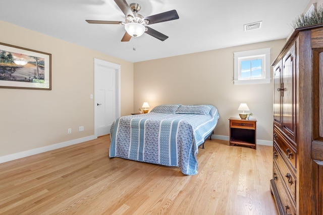 6 Tannery Way, Kensington, NH 03833 - bedroom with light wood-style floors, baseboards, and a ceiling fan