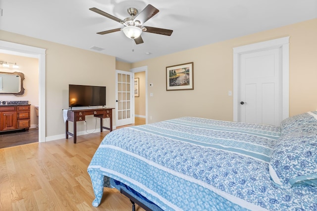 6 Tannery Way, Kensington, NH 03833 - bedroom featuring light wood-style flooring, a ceiling fan, and baseboards