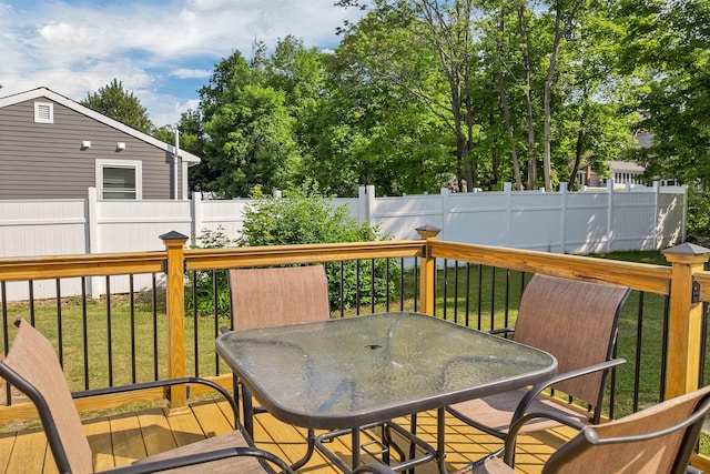 39 Orchard St, Laconia, NH 03246 - wooden terrace featuring outdoor dining area