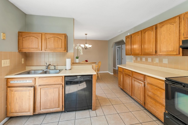 39 Orchard St, Laconia, NH 03246 - kitchen featuring black appliances, a sink, light tile patterned floors, light countertops, and a chandelier