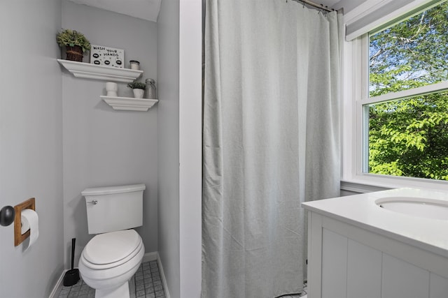 4 Franconia Dr, Nashua, NH 03063 - bathroom featuring toilet, baseboards, vanity, tile patterned floors, and a shower with shower curtain