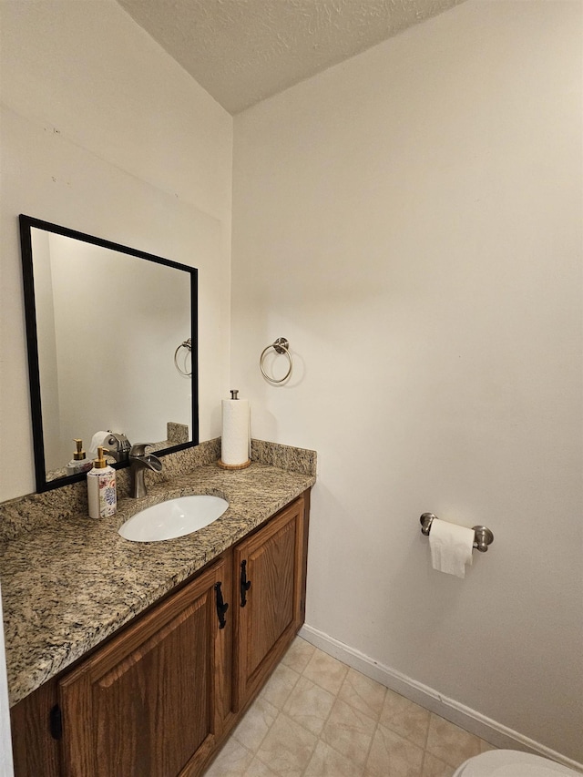 302 Eastview Dr, Wilton, NH 03086 - bathroom with vanity and baseboards