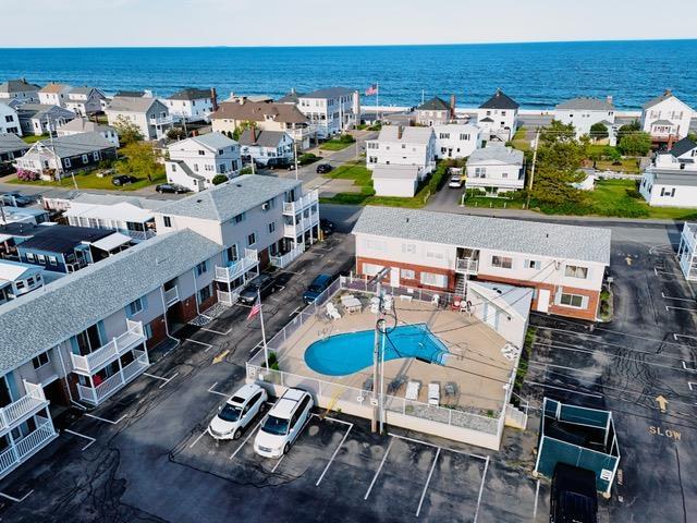 68 Kings Hwy Unit 30, Hampton, NH 03842 - bird's eye view of a pool and a nearby body of water