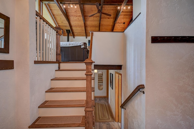 33 Karwendal Strasse, Bartlett, NH 03812 - staircase with wooden ceiling, a ceiling fan, a textured wall, and wood finished floors